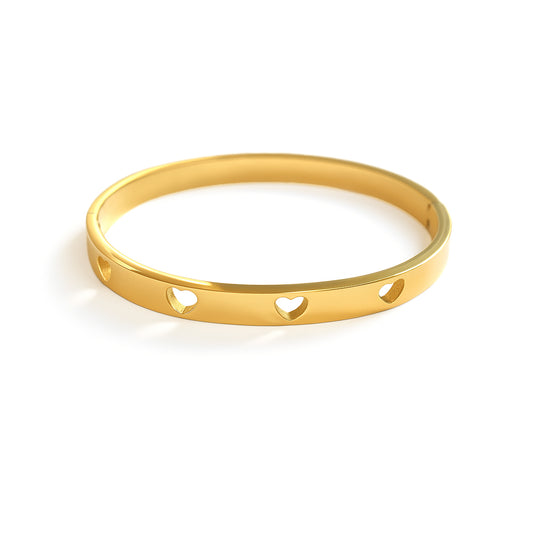 Bracciale rigido cuori vuoti oro